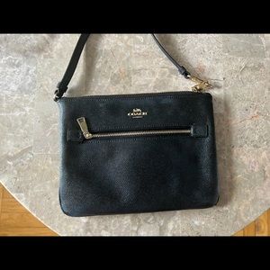 *Used*Large black COACH wristlet with gold hardware.
